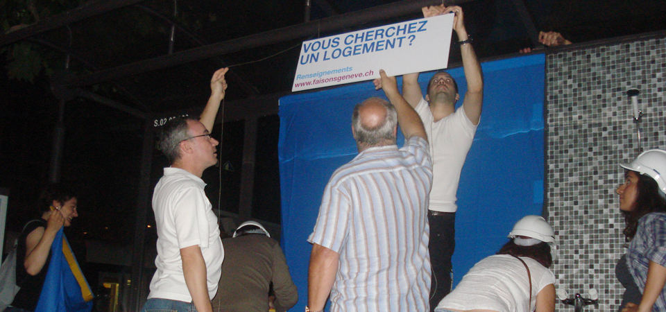 people decorating the bus shelter