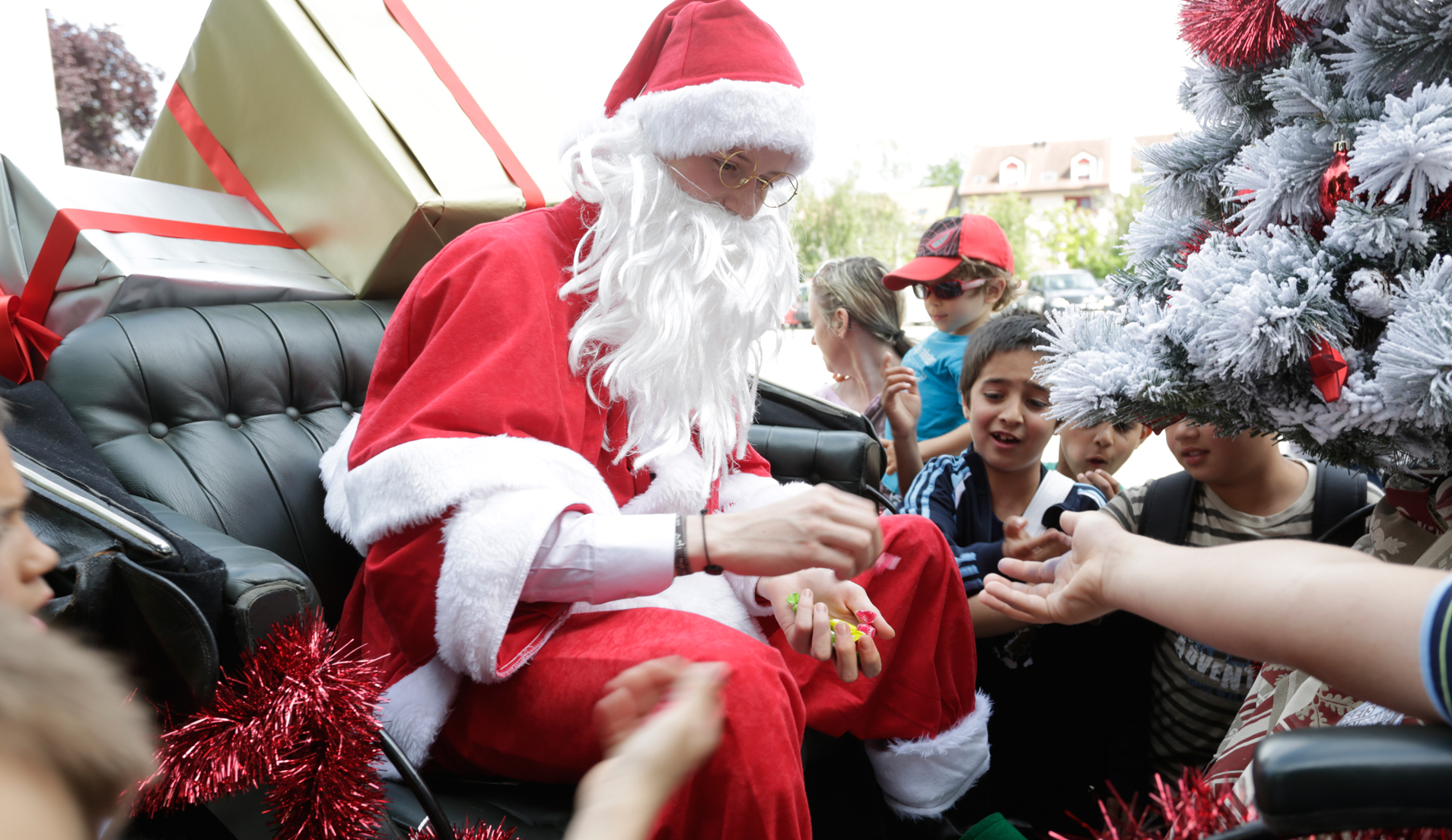 Guerrilla marketing Santa Claus giving candies