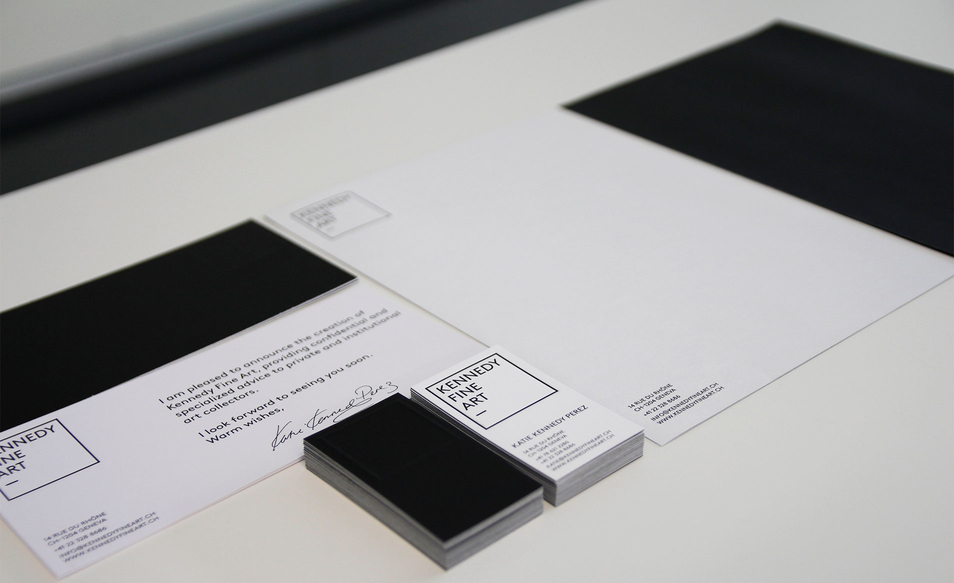 various stationery products corresponding to the visual identity