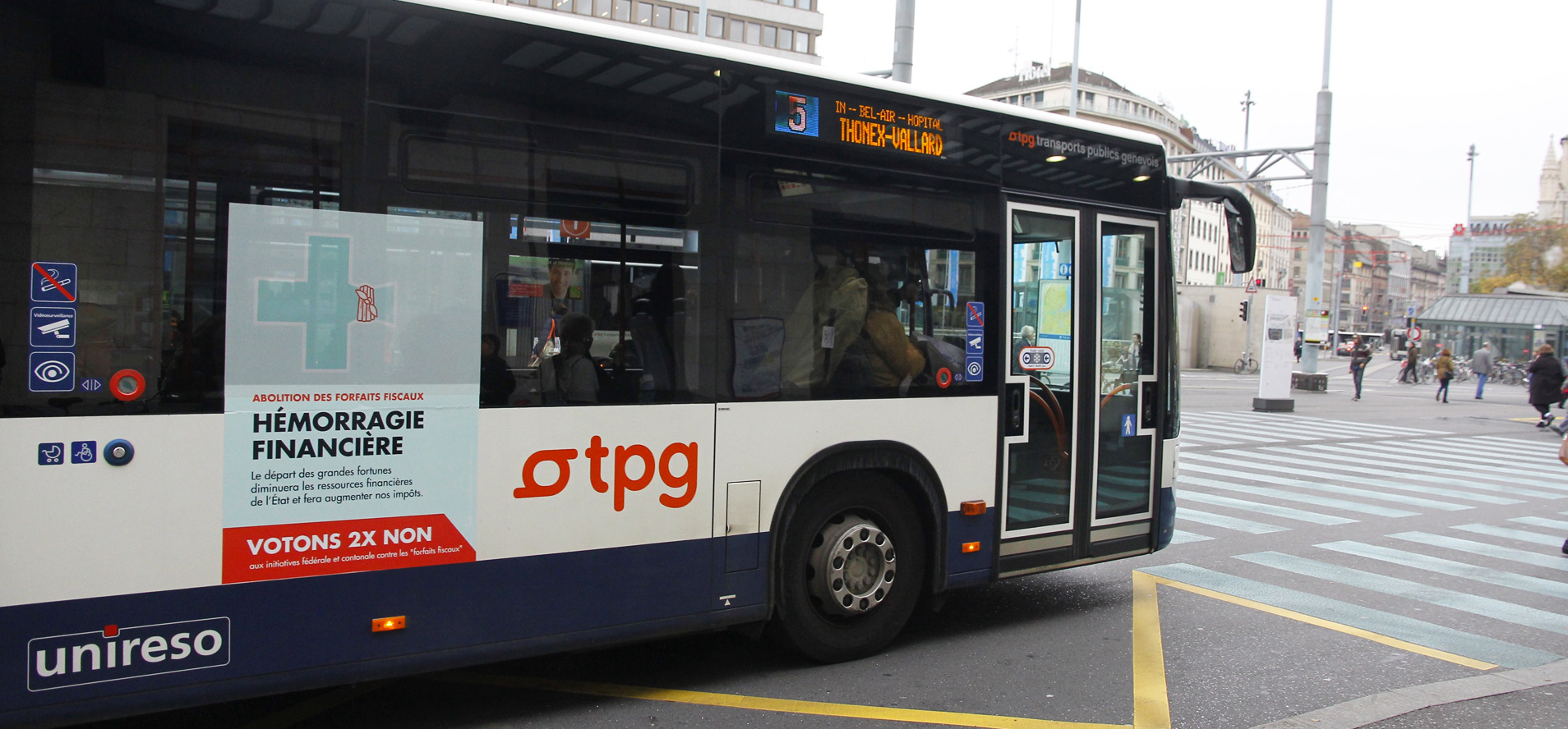 Political campaign poster on a bus